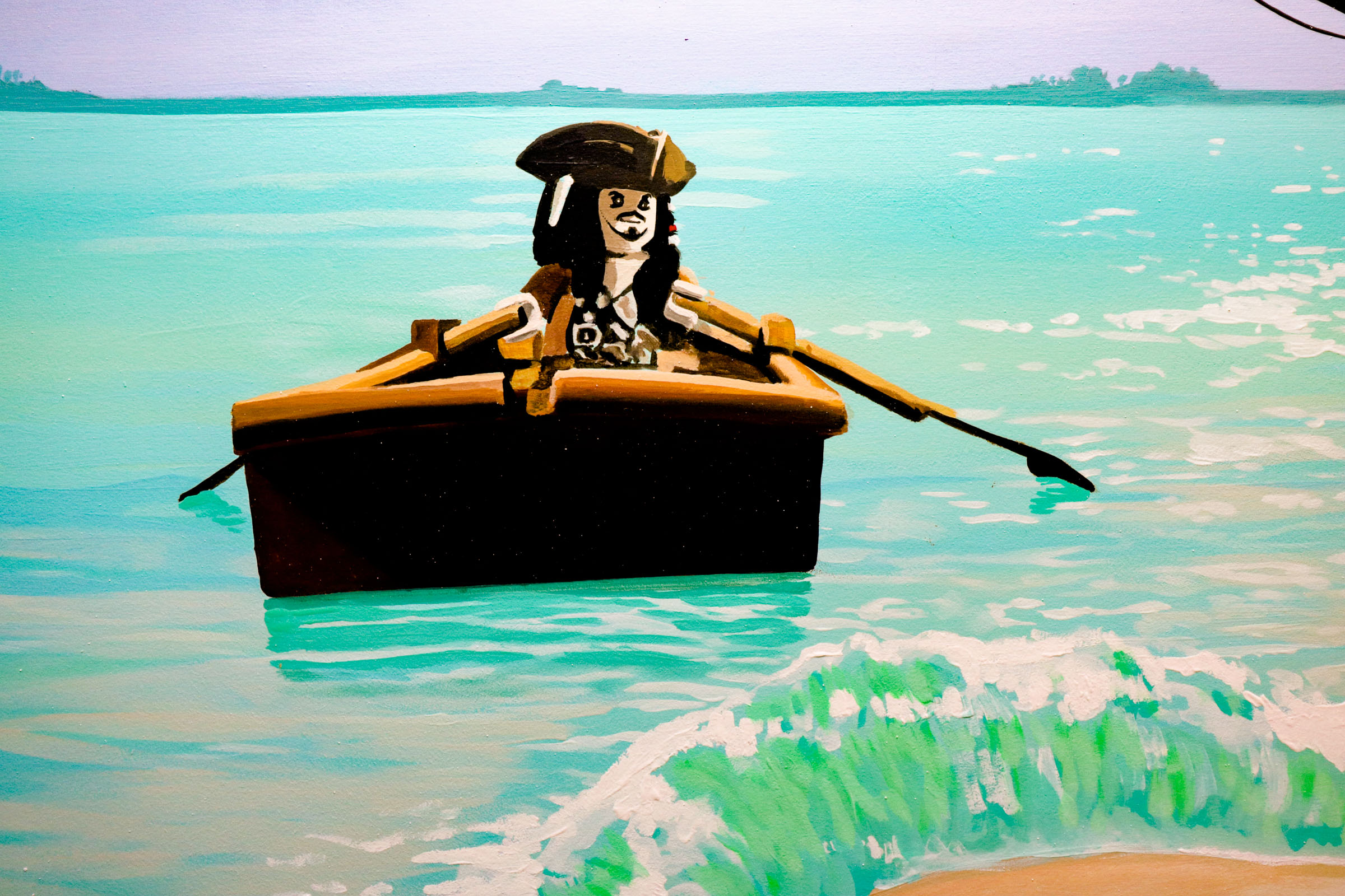 Lego Jack Sparrow rowing a little boat in wallmural