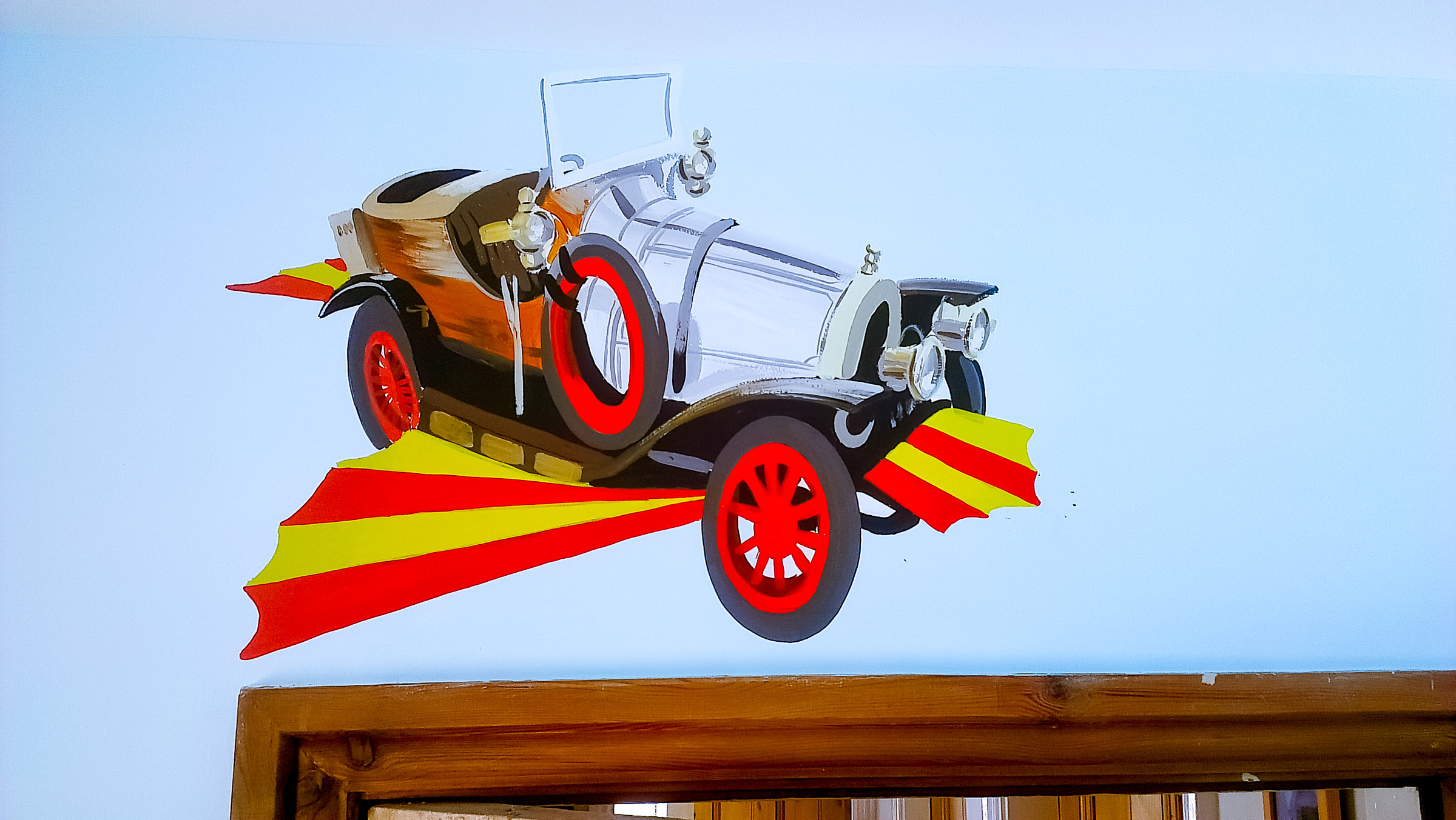 Chitty Chitty Bang Bang joining in the flying fun over the door architrave