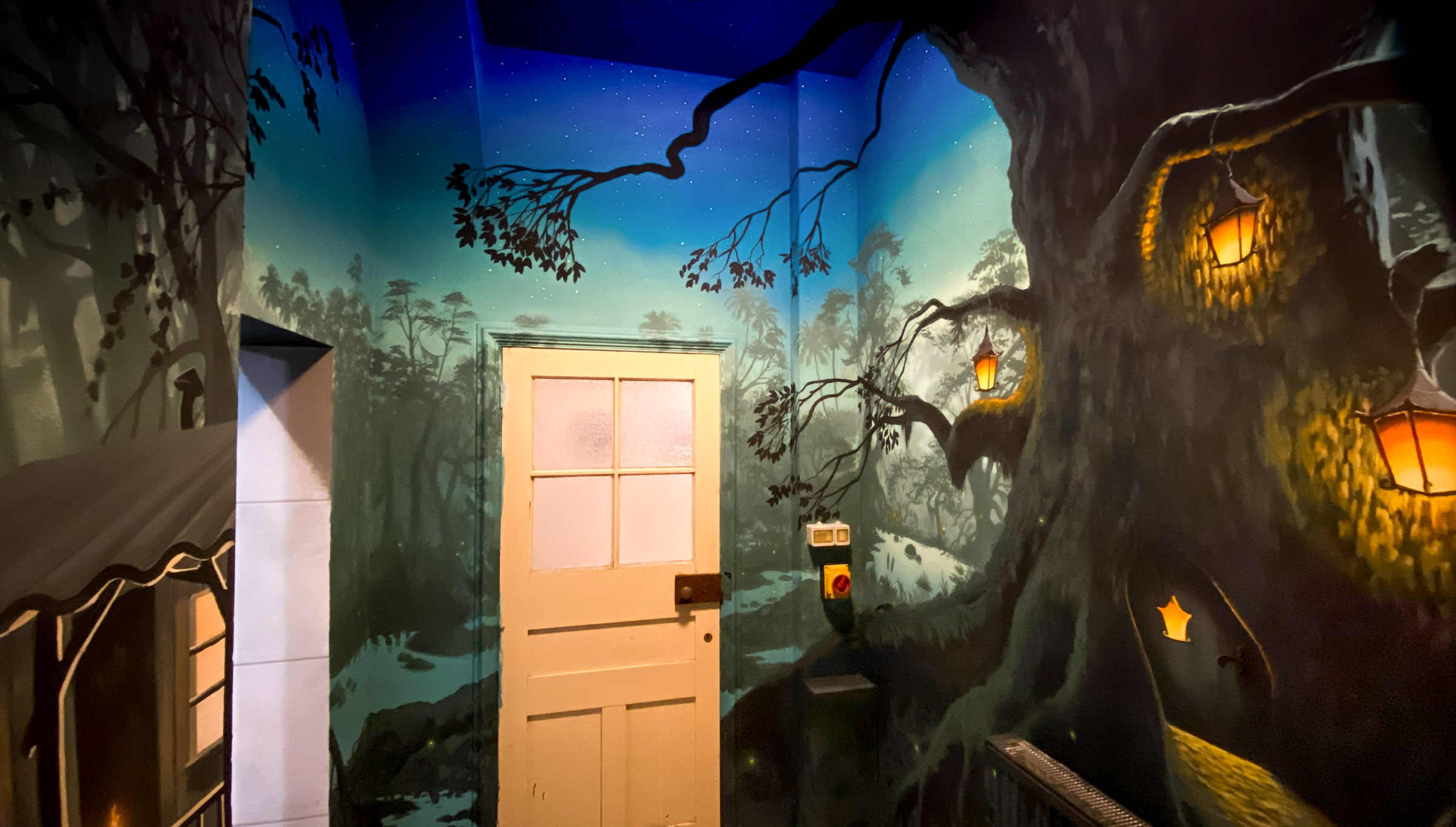 Lantern lit swamp Mural with large tree